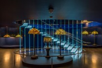 The Gallery of Tiffany Lamps, designed by renowned Czech architect Eva Jiřičná, comprises a 4,800-square-ft, two-story space measuring nearly a city block with its soaring glass Norman S Benzaquen Grand Staircase